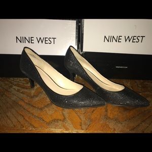 Black closed toe heels with sparkles size 10